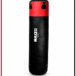 Black and red hanging heavy punching bag for boxing, kickboxing, MMA, and fitness training on a white background