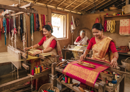 Handwoven silk of Assam featuring traditional Muga, Eri, and Pat silk textiles with intricate Assamese weaving designs.